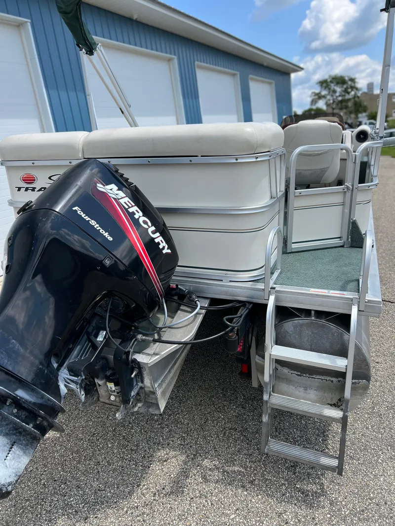 Slide: The Image of 2006 Sun Tracker PB 24 pontoon boat with Mercury outboard motor. - 19
