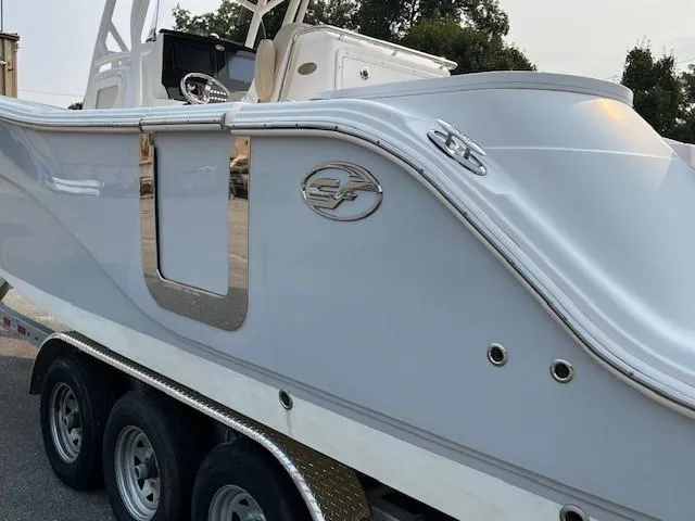 Slide: The Image of 2018 Sea Fox 288 Commander boat on trailer, side view. - 11