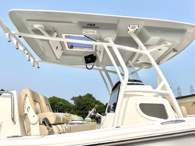 Slide: The Image of 2018 Sea Fox 288 Commander boat with T-top and seating, outdoor view. - 12