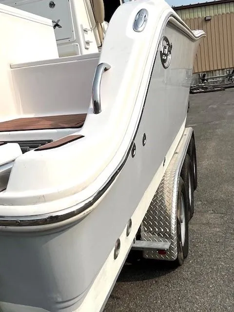 Slide: The Image of 2018 Sea Fox 288 Commander boat on a trailer, side view. - 13