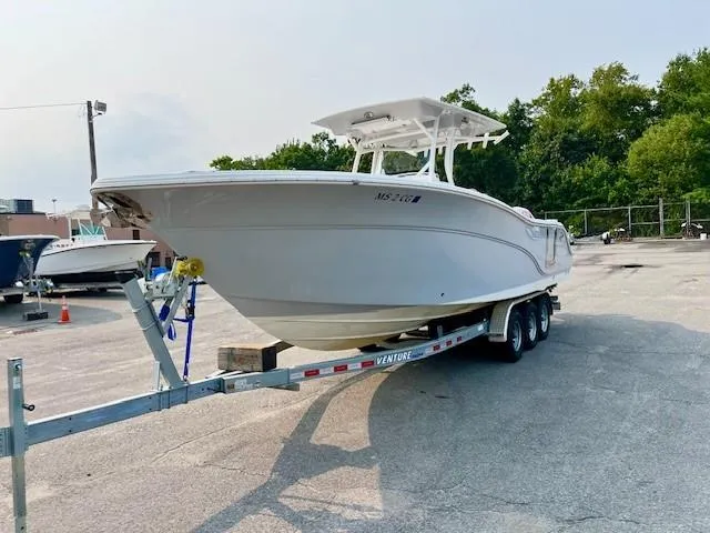 Slide: The Image of 2018 Sea Fox 288 Commander boat on trailer in parking lot. - 2