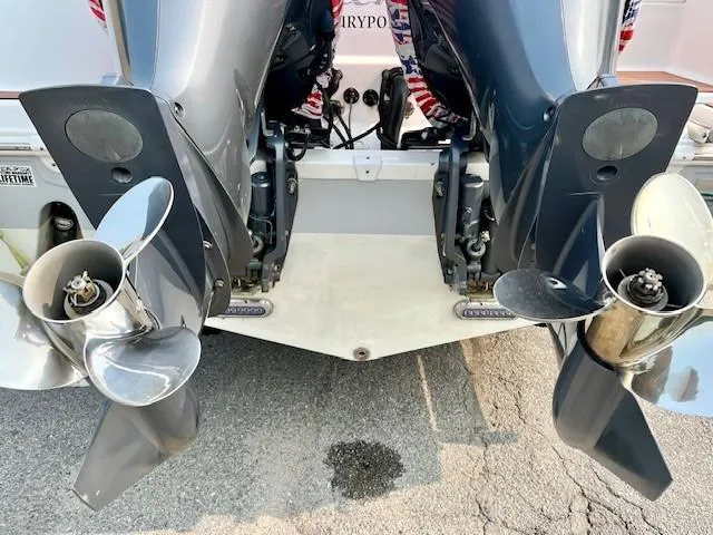 Slide: The Image of 2018 Sea Fox 288 Commander boat with dual outboard engines and stainless steel propellers. - 23