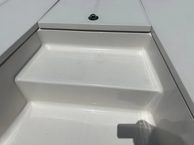 Slide: The Image of 2024 Sea Born FX21 Bay LT boat deck and step detail. - 12