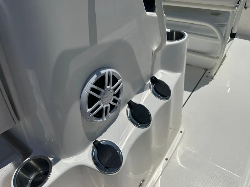 Slide: The Image of 2024 Sea Born FX21 Bay LT boat console with speaker and cup holders. - 15