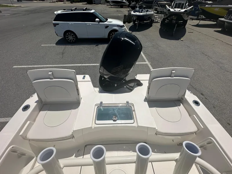 Slide: The Image of 2024 Sea Born FX21 Bay LT boat with outboard motor and seating. - 30