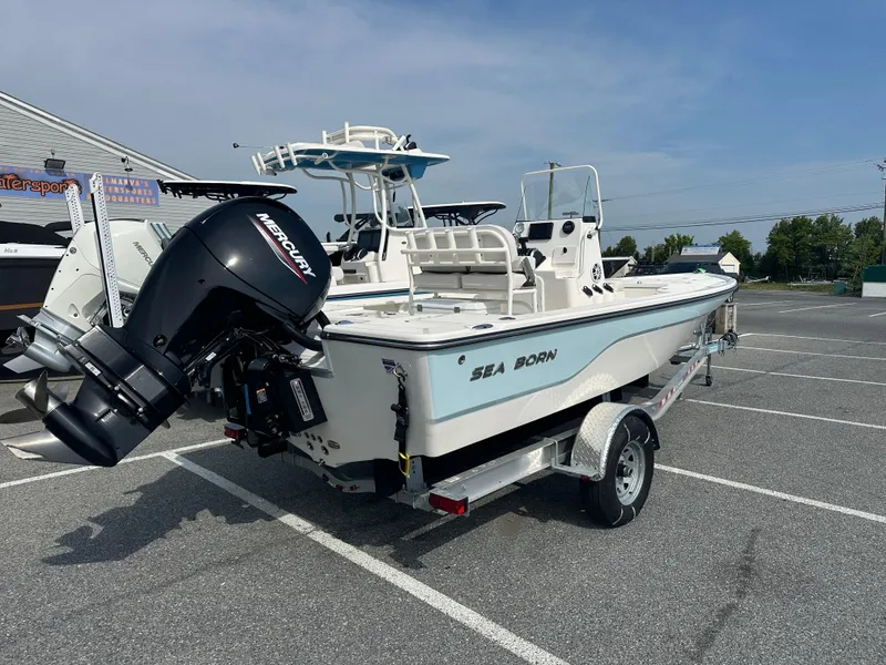 Slide: The Image of 2024 Sea Born FX21 Bay LT boat with Mercury outboard motor on trailer. - 5