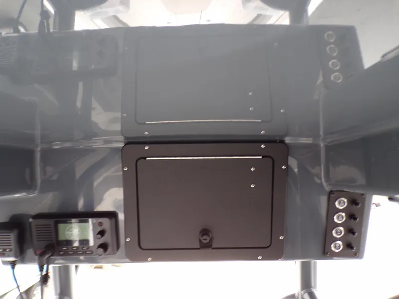 Slide: The Image of 2024 Sea Born LX24 Center Console LE dashboard with storage compartments and control panel. - 10