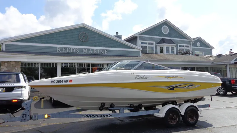 The Image of 2002 Rinker 212 Captiva Bowrider on trailer at Reeds Marine. - 1