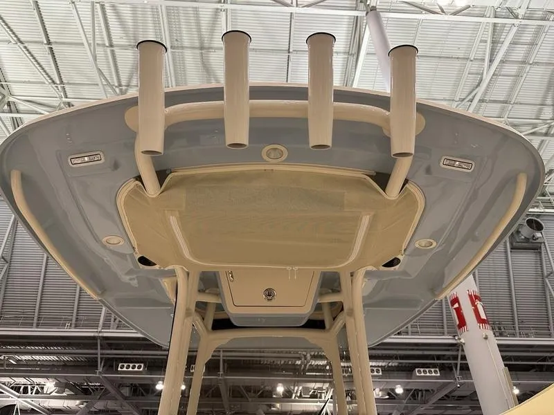 Slide: The Image of 2025 Grady-White Fisherman 257 boat, view of the T-top and rod holders. - 11