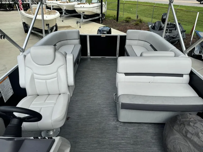 Slide: The Image of 2023 Godfrey 2286 pontoon boat with spacious seating and modern design. - 8