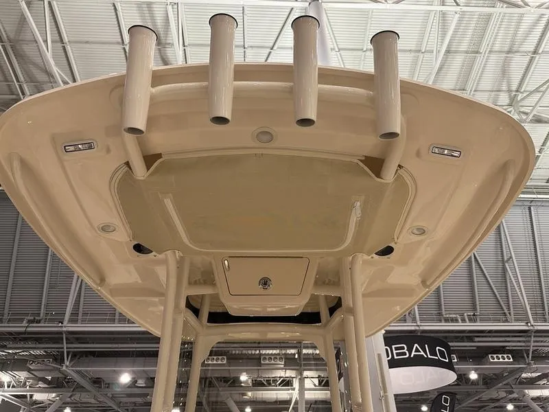 Slide: The Image of 2025 Grady-White Fisherman 236 boat top view with rod holders and overhead lights. - 10