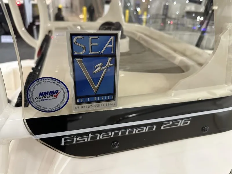 Slide: The Image of 2025 Grady-White Fisherman 236 boat with SEA V2 hull design and NMMA certification. - 12