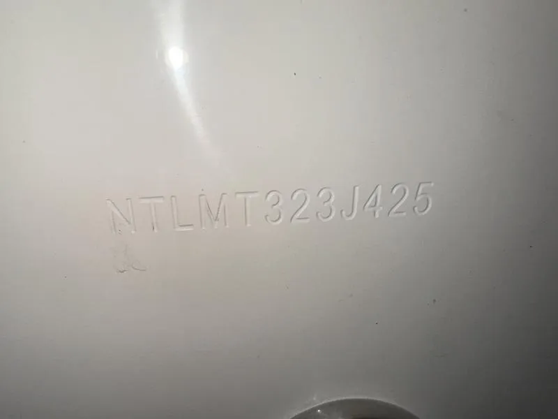 Slide: The Image of 2025 Grady-White Fisherman 236 hull identification number (HIN) embossed on white surface. - 5