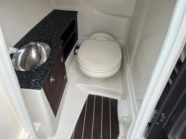 Slide: The Image of 2014 Monterey 268 Super Sport boat bathroom with sink and toilet. - 12
