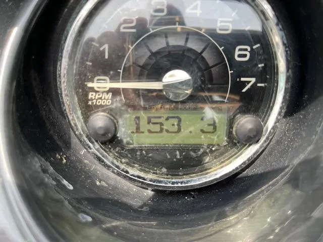 Slide: The Image of Close-up of 2014 Monterey 268 Super Sport tachometer showing 153.3 hours. - 2