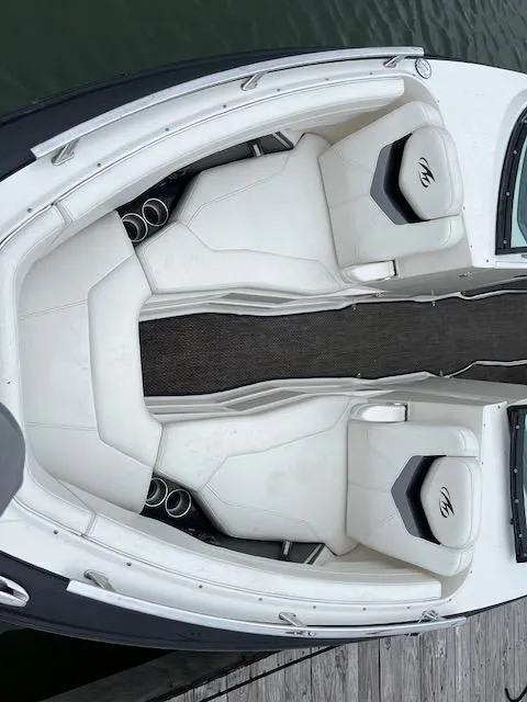 Slide: The Image of 2014 Monterey 268 Super Sport boat with white seating and cup holders. - 5