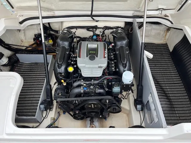 Slide: The Image of 2014 Monterey 268 Super Sport boat engine compartment with open hatch. - 9