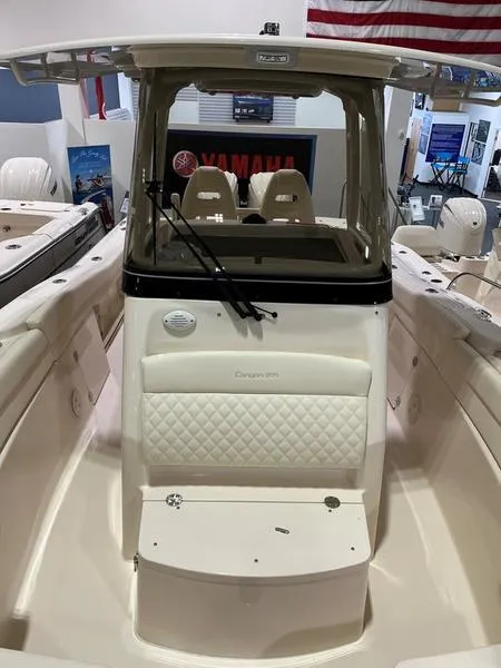Slide: The Image of 2025 Grady-White CAYNON 271 boat interior with seating and windshield. - 11