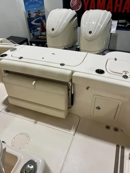 Slide: The Image of 2025 Grady-White CAYNON 271 boat with Yamaha engines, featuring a spacious deck layout. - 6
