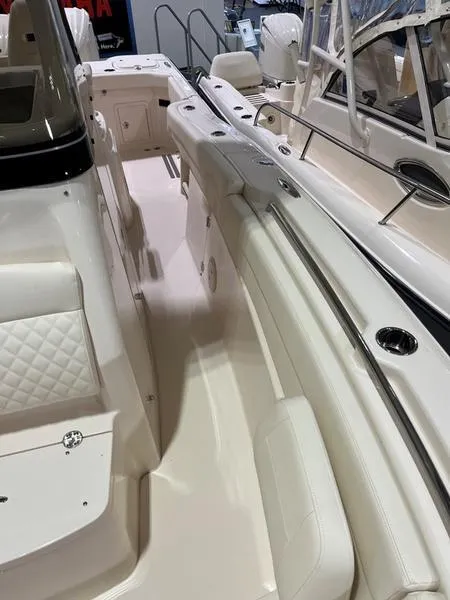 Slide: The Image of 2025 Grady-White CAYNON 271 boat interior with sleek seating and modern design. - 9