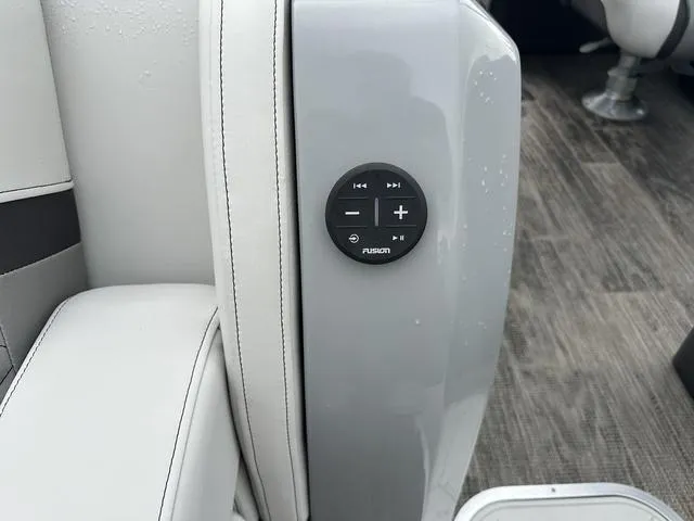 Slide: The Image of 2025 Godfrey AP 255 SBC boat dashboard with steering wheel and digital display. - 20