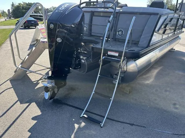 Slide: The Image of Audio control panel on 2025 Godfrey AP 255 SBC boat, featuring Fusion brand buttons. - 24