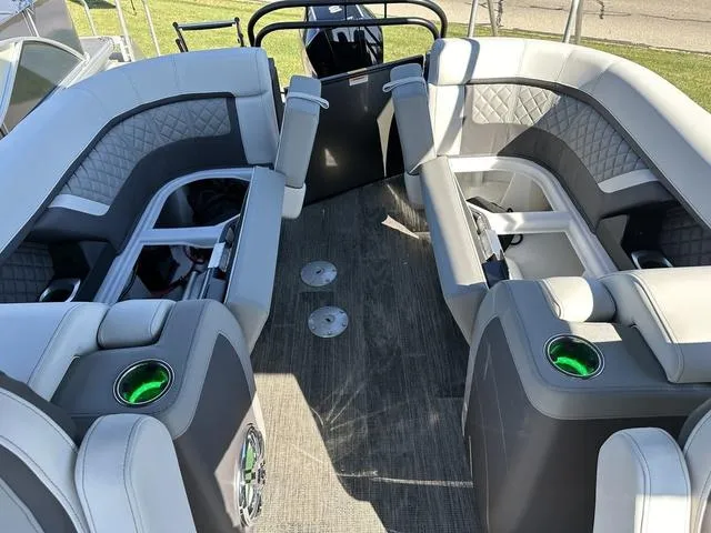 Slide: The Image of 2025 Godfrey AP 255 SBC boat interior with modern seating and control panel. - 30