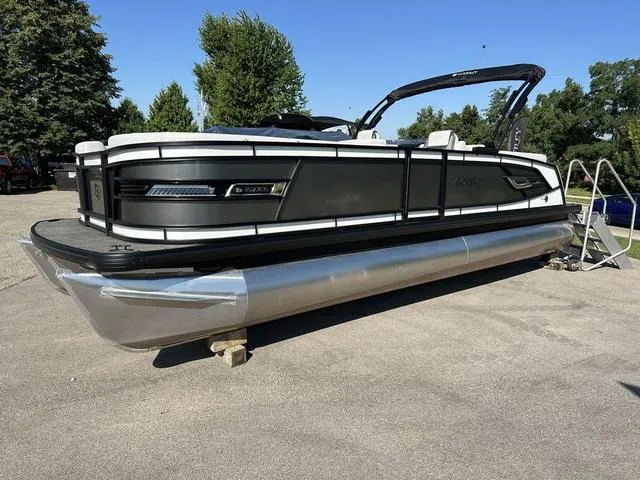 Slide: The Image of 2025 Godfrey AP 255 SBC boat engine, featuring sleek black design and modern branding. - 6