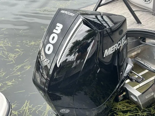 Slide: The Image of Luxurious interior of 2025 Godfrey AP 255 SBC with quilted upholstery and illuminated cup holder. - 8