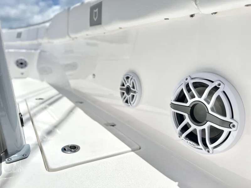 Slide: The Image of Close-up of 2025 Sea Fox 328 Commander boat speakers and deck. - 40