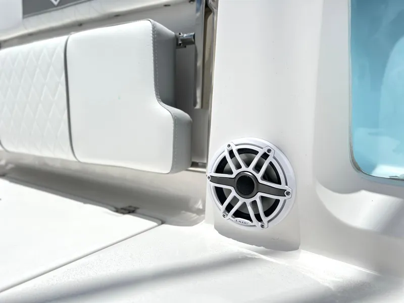 Slide: The Image of 2025 Sea Fox 328 Commander boat interior with speaker and cushioned seating. - 42