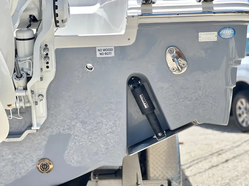 Slide: The Image of 2025 Sea Fox 328 Commander boat transom with hydraulic components. - 5