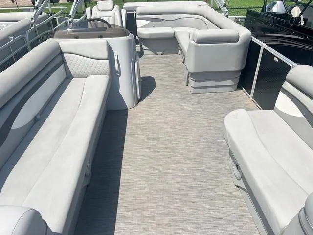 Slide: The Image of 2023 Bennington 208 SL pontoon boat interior with spacious seating and modern design. - 3