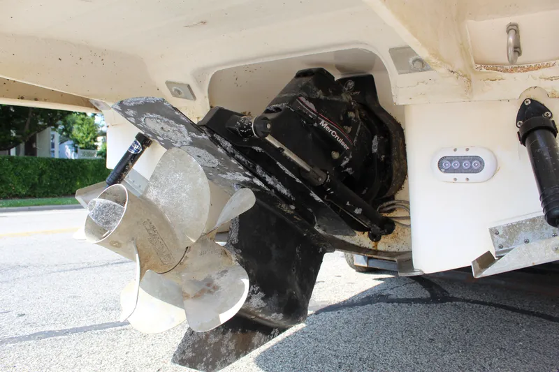 Slide: The Image of 2012 Regal 28 Express boat propeller and stern drive detail. - 8