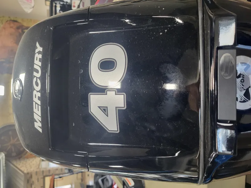 Slide: The Image of Mercury 40 horsepower outboard motor on a 2024 Tracker Grizzly 1754 SC boat. - 7