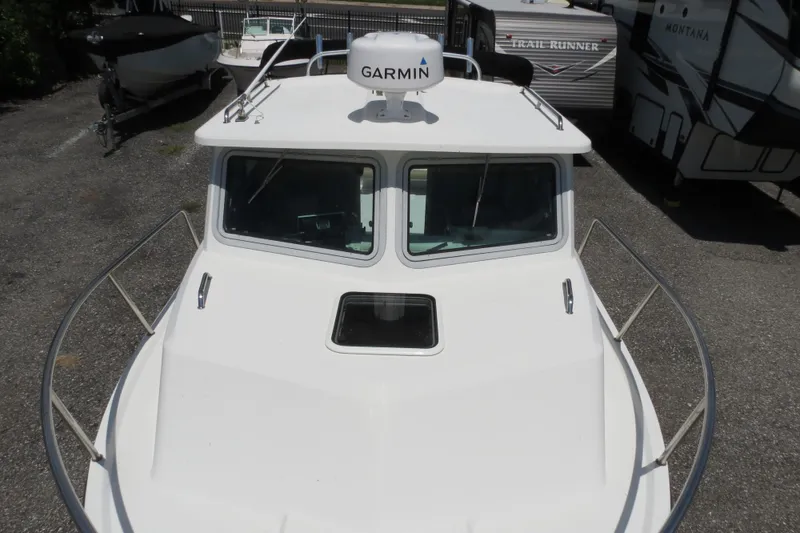 Slide: The Image of 2018 Parker 2520 XLD Sport Cabin boat with Garmin radar system. - 43