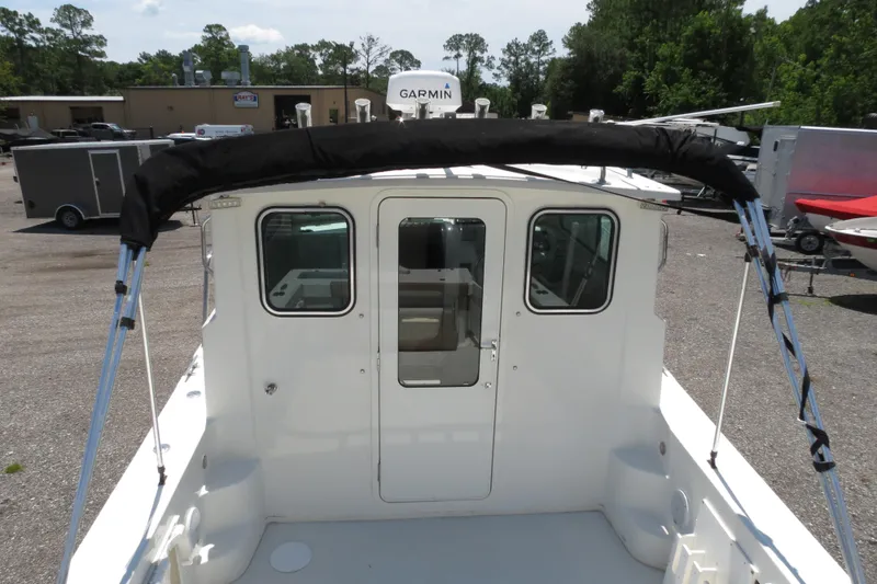 Slide: The Image of 2018 Parker 2520 XLD Sport Cabin boat with Garmin radar, rear view. - 49