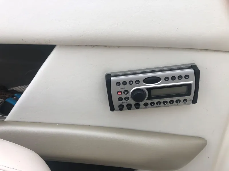 Slide: The Image of Control panel in a 2006 Larson 248 LXI boat interior. - 6