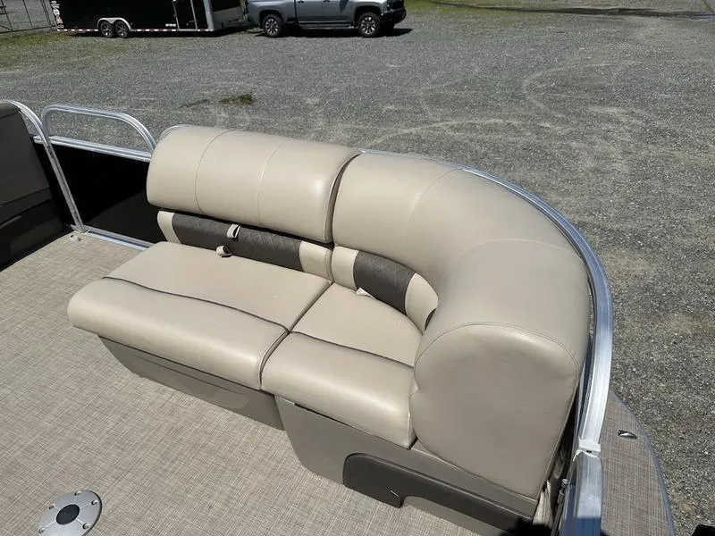Slide: The Image of 2021 Sun Tracker PB 22 RF pontoon boat with beige seating. - 13