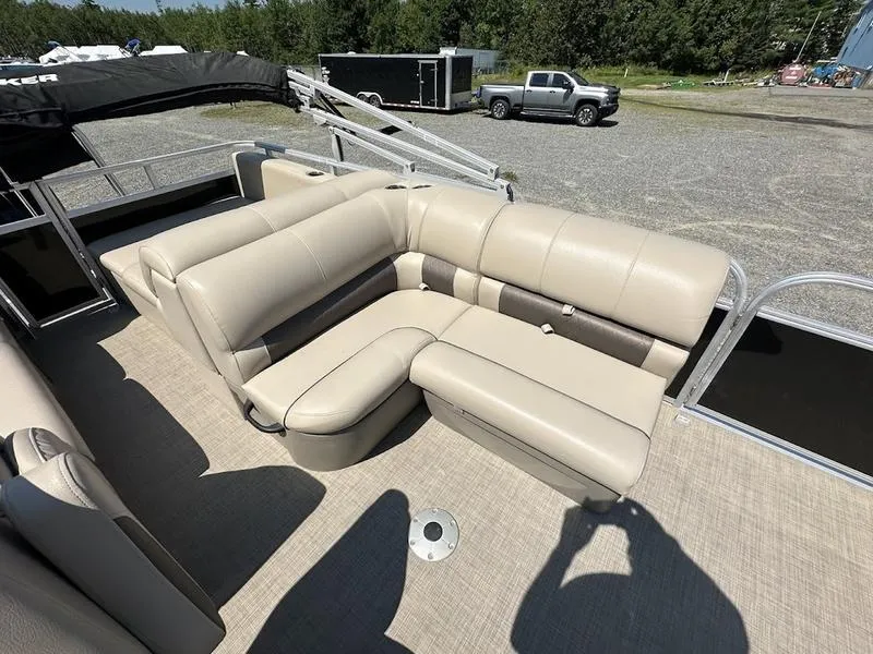 Slide: The Image of 2021 Sun Tracker PB 22 RF pontoon boat with beige seating and spacious deck. - 6