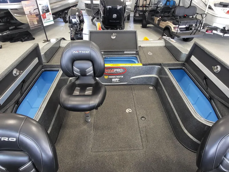 Slide: The Image of 2018 Nitro ZV21 fishing boat interior with seating and storage compartments. - 8