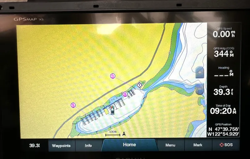 Slide: The Image of GPS navigation screen on a 1992 Bayliner 3288, showing map and coordinates. - 12