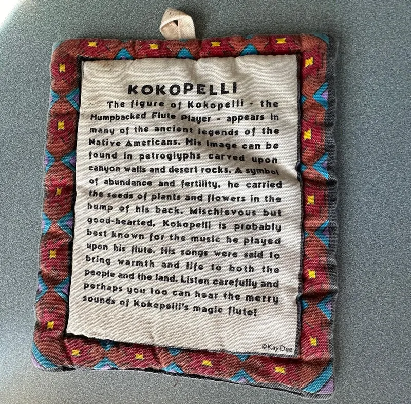 Slide: The Image of Decorative Kokopelli wall hanging with text about Native American legend. - 29