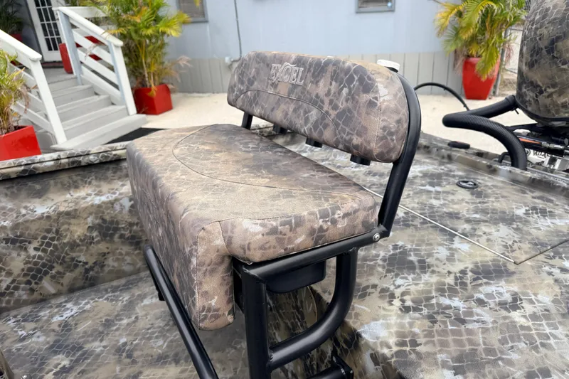 Slide: The Image of Camouflage seating on 2025 Excel 1960 Stalker CC boat, outdoor setting. - 35