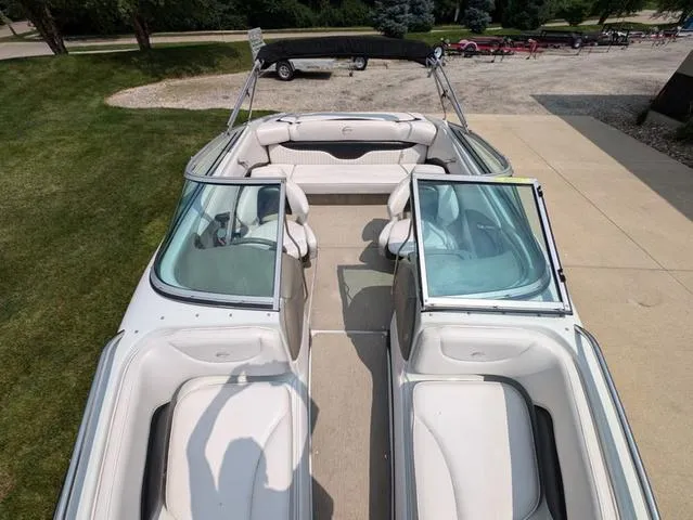Slide: The Image of 2013 Crownline 21 SS boat interior with open seating and windshield. - 8