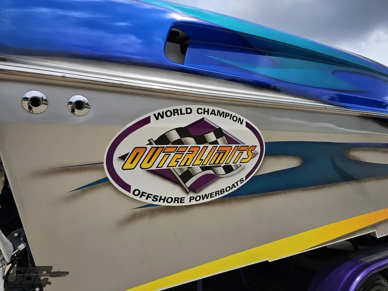 Slide: The Image of 2004 Outerlimits 42 Legacy powerboat with World Champion Offshore Powerboats decal. - 15