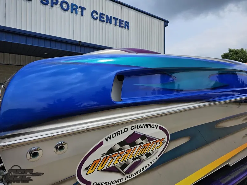 Slide: The Image of 2004 Outerlimits 42 Legacy powerboat at a sport center. - 17