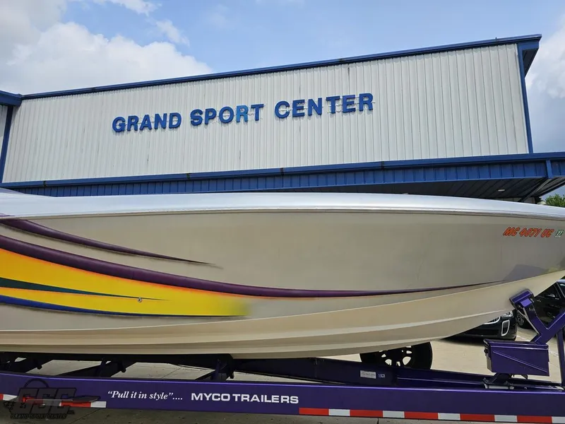 Slide: The Image of 2004 Outerlimits 42 Legacy boat at Grand Sport Center on Myco trailer. - 25