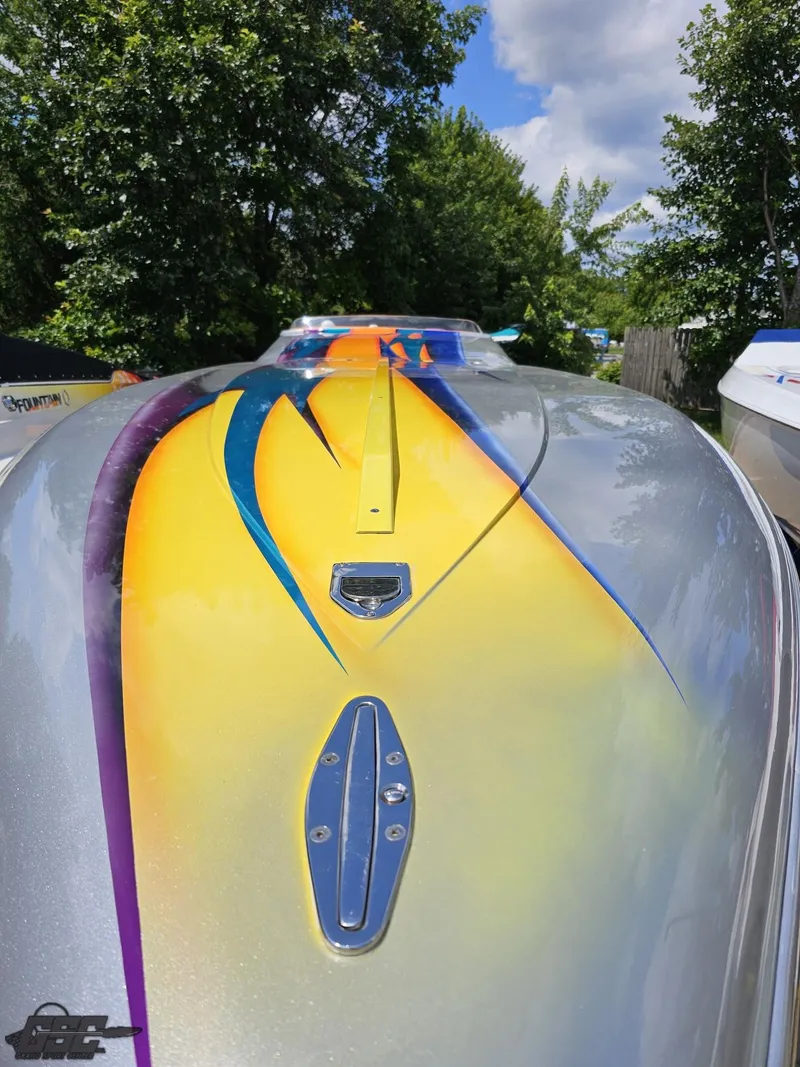 Slide: The Image of 2004 Outerlimits 42 Legacy speedboat with vibrant custom paint job. - 29