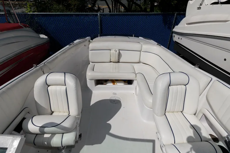 Slide: The Image of 2001 Chris-Craft Launch 22 boat interior with white seating and sleek design. - 7